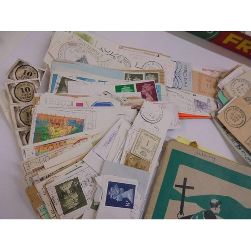 1179 - A mixed lot of loose stamps etc.,