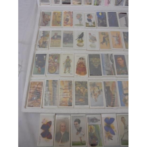 1185 - 125 sets of replica cigarette cards with information.