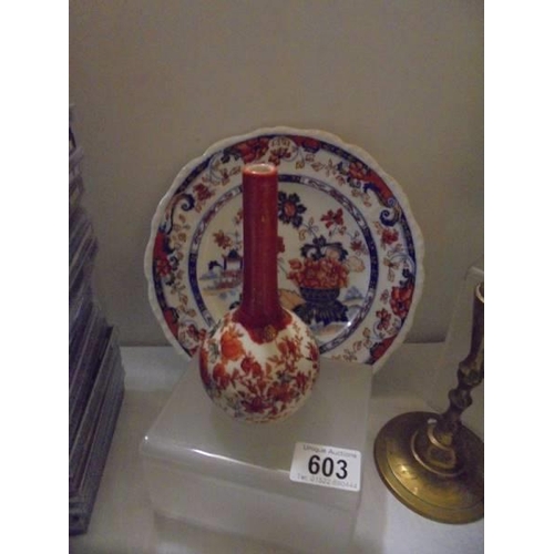 603 - A small Chinese vase and a Chinese plate.