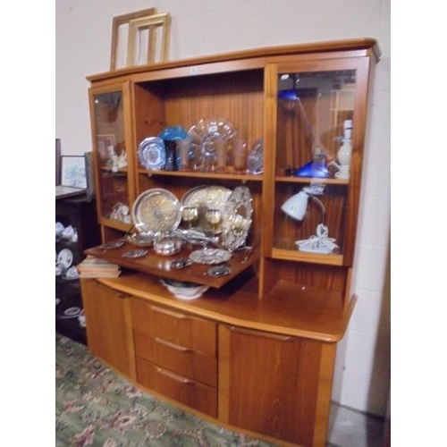 524 - A good quality teak wall unit. COLLECT ONLY.