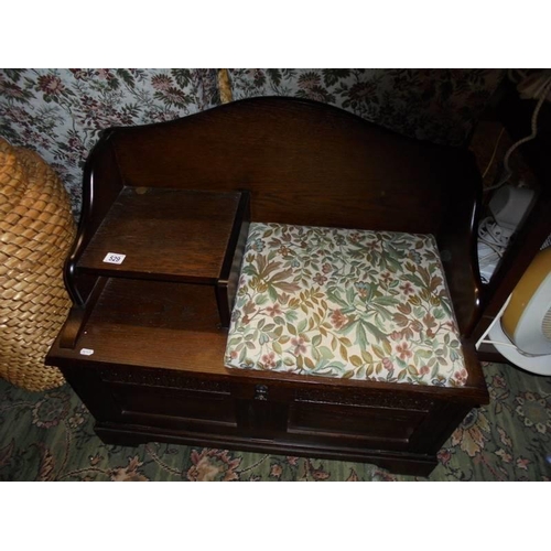 529 - An oak telephone seat. COLLECT ONLY.