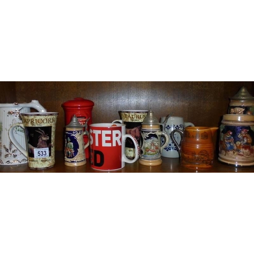 533 - A mixed lot of tankards, beer steins, mugs etc.,