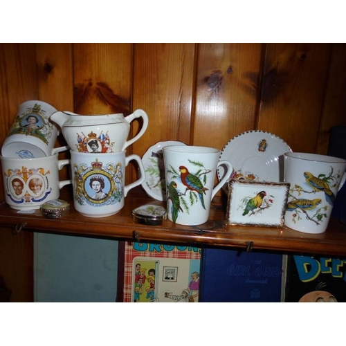 546 - A mixed lot of commemorative and bird decorated ceramics.