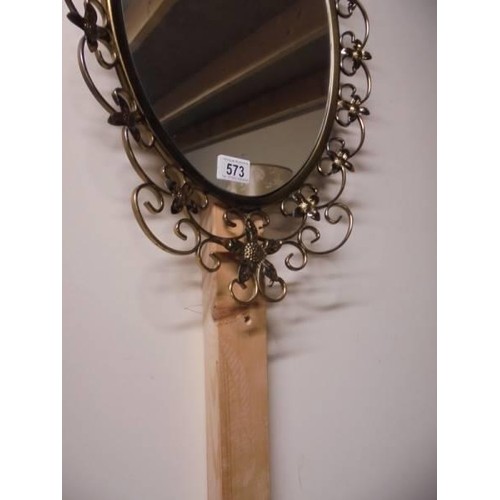 573 - A vintage wrought iron framed mirror. COLLECT ONLY.