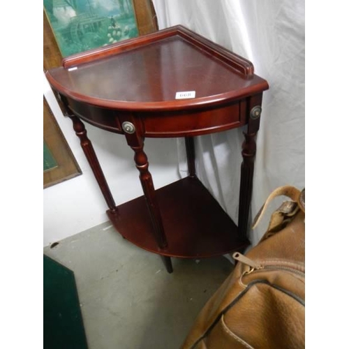 668 - A mahogany effect corner table, COLLECT ONLY.