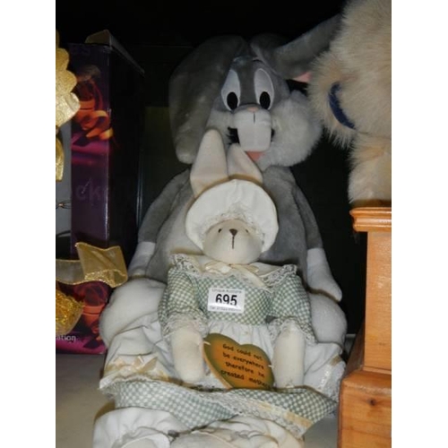 695 - A mixed lot of soft toys including Bugs Bunny and a Christmas angel.