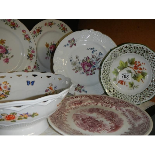 708 - A mixed lot of ceramic plates etc.,