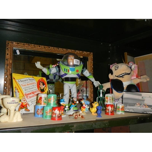 725 - A mixed lot of toys including Buzz Lightyear.