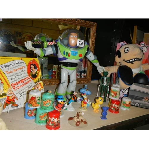 725 - A mixed lot of toys including Buzz Lightyear.