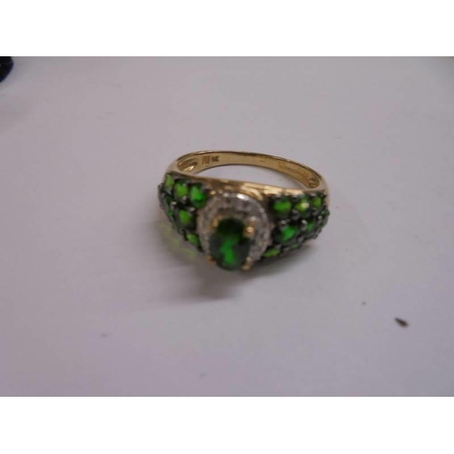 1030 - A 9ct gold diamond and Russian kinto ring, size P.