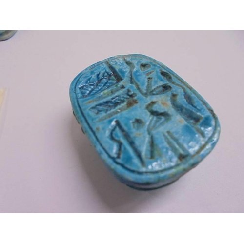 1035 - Four Egyptian turquoise scarab beetle seals/beads.