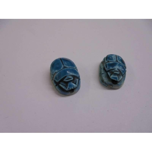 1035 - Four Egyptian turquoise scarab beetle seals/beads.