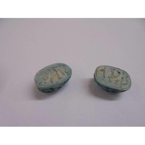 1035 - Four Egyptian turquoise scarab beetle seals/beads.