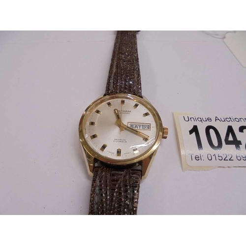 1042 - A Waltham self winding date watch.