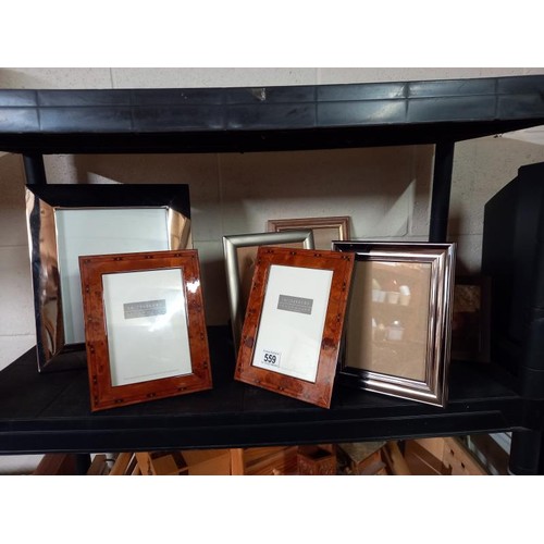 559 - A mixed lot of photo frames.