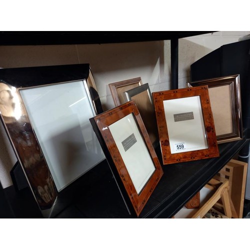 559 - A mixed lot of photo frames.