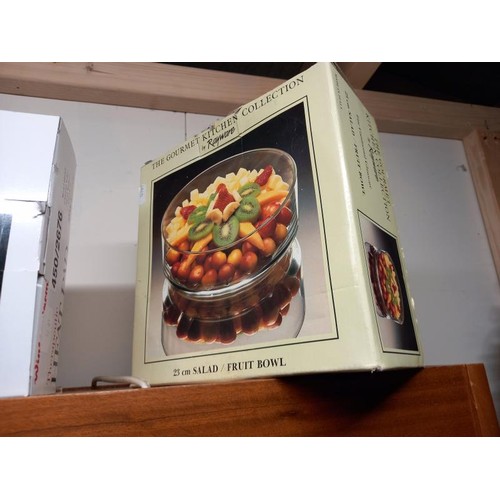 568 - A boxed heat pad, salad server set and fruit bowl.