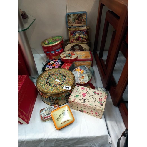 605 - A good lot of vintage tins