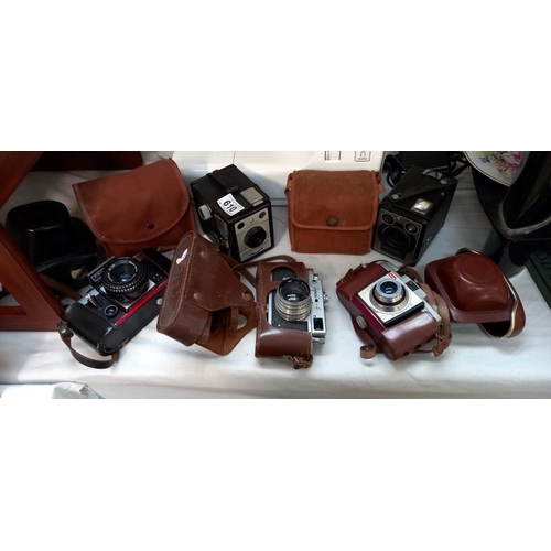 610 - 5 cased vintage cameras