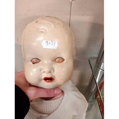 625 - A vintage celluloid headed doll