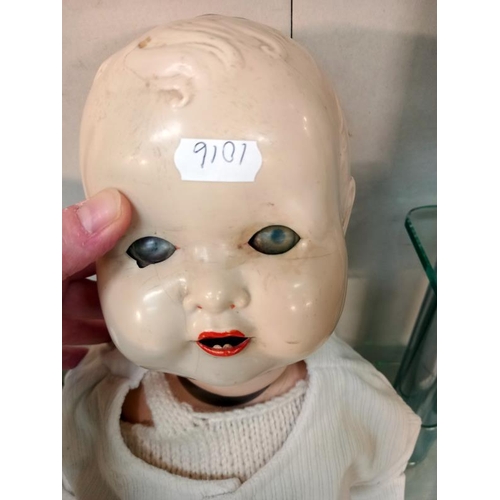 625 - A vintage celluloid headed doll