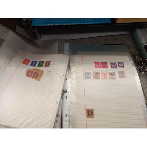 648 - 2 folders containing stamps