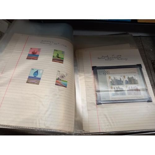 648 - 2 folders containing stamps