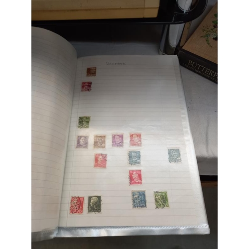 648 - 2 folders containing stamps