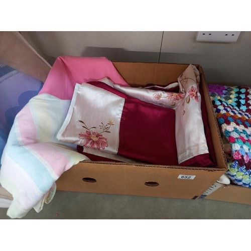 652 - 2 boxes of sheets, single duvet cover, crocheted blanket etc