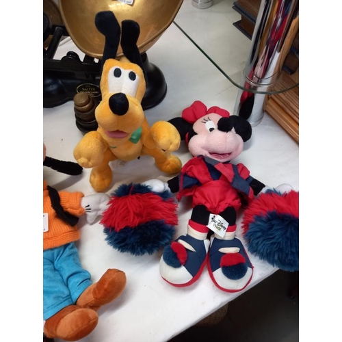 669 - A quantity of toys from Walt Disney world including Mickey and Minnie Mouse