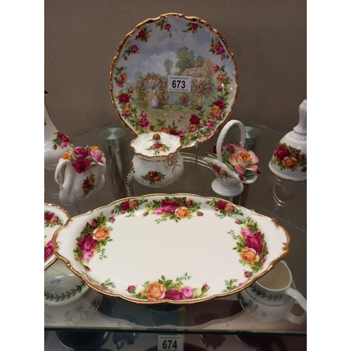 673 - A quantity of Royal Albert Country Rose ornaments etc