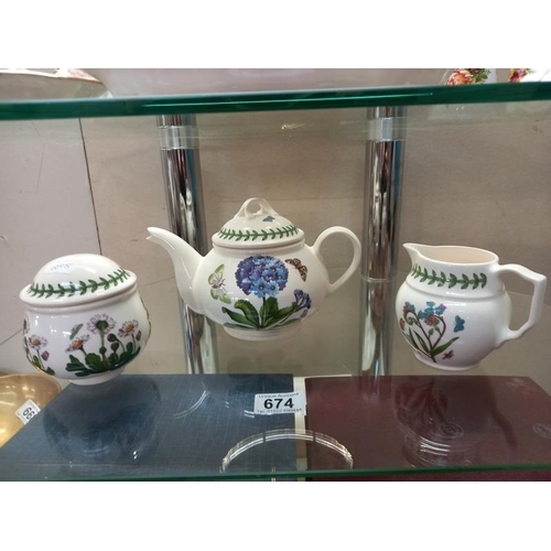 674 - A Port Meirion teapot, sugar bowl and milk jug