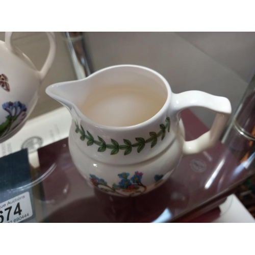 674 - A Port Meirion teapot, sugar bowl and milk jug