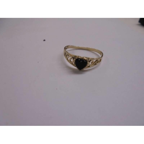 1053 - A heart design ring dated Sheffield 1994, hall marked 9ct gold, size M half, 1 gram.