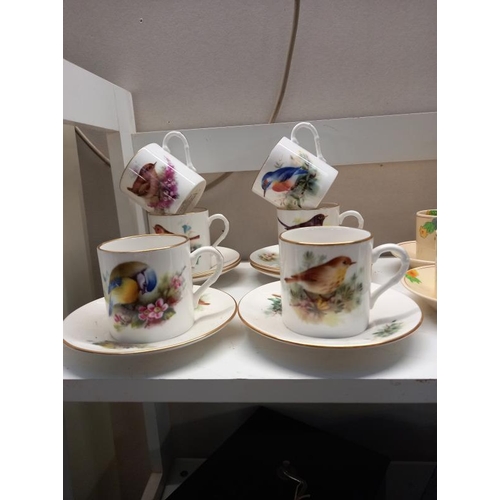 681 - A quantity of Royal Worcester 'Best loved birds' coffee cans & saucers & a Royal Doulton coffee set