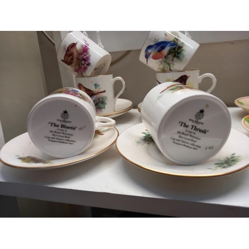 681 - A quantity of Royal Worcester 'Best loved birds' coffee cans & saucers & a Royal Doulton coffee set