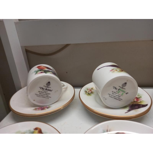 681 - A quantity of Royal Worcester 'Best loved birds' coffee cans & saucers & a Royal Doulton coffee set