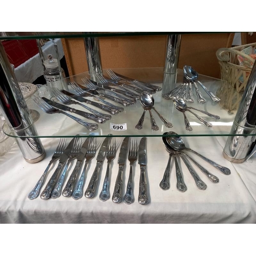 690 - A quantity of Kings pattern cutlery 6 large knives & forks, 5 small knives & forks, 6 dessert spoons... 