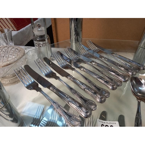 690 - A quantity of Kings pattern cutlery 6 large knives & forks, 5 small knives & forks, 6 dessert spoons... 