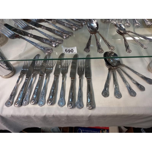 690 - A quantity of Kings pattern cutlery 6 large knives & forks, 5 small knives & forks, 6 dessert spoons... 