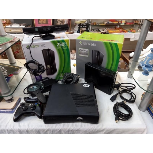 694 - An Xbox 360 with box & an empty Xbox 360 box etc.