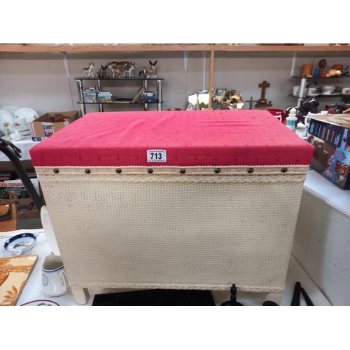 713 - A vintage loom linen box with upholstered top