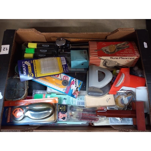 732 - A box of various office supplies