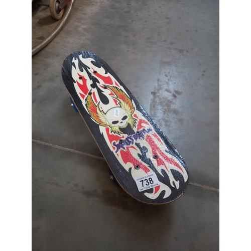 738 - A Skulls skateboard