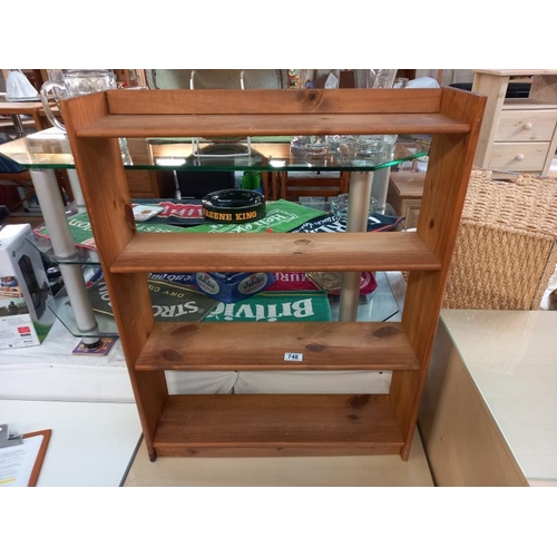 748 - A solid pine book shelves, 63cm x 17cm x 51cm high