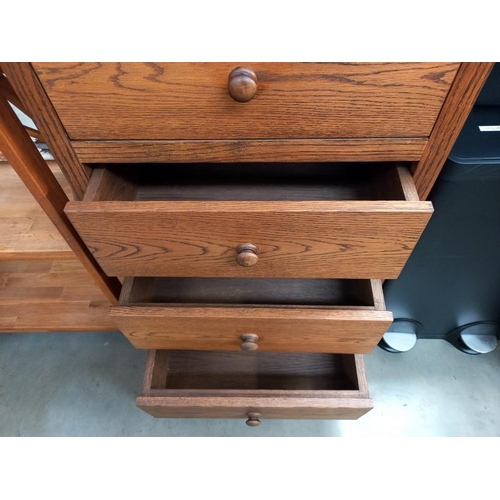 759 - A medium oak chest of drawers, 62cm x 34cm x 123cm