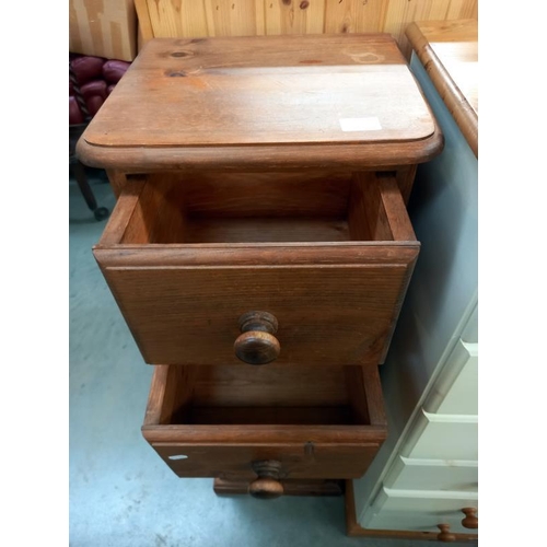 766 - A dark stained solid pine narrow chest of drawers, 38cm x 33cm x 113cm