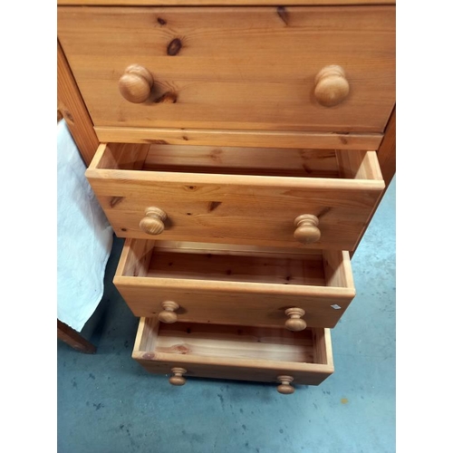 767 - A solid pine 5 drawer chest of drawers, 61cm x 42cm x 120cm high