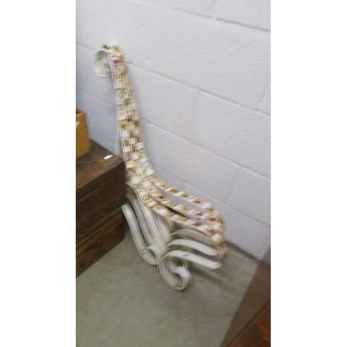 927 - Three wrought iron bench ends. COLLECT OLY.