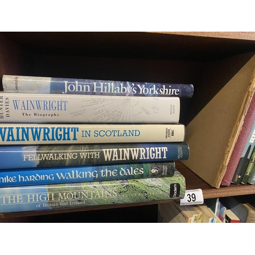 39 - A collection of walking & travel books including Wainwright (2 shelves)